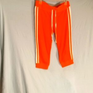 Juicy Couture Orange terry Cloth capris with White Side Stripes Great Condition